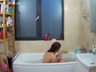 Girlfriend shaving armpits in the bathtube. hidden cam-0
