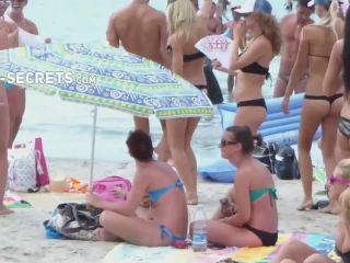 Club promoters dancing on beach-5